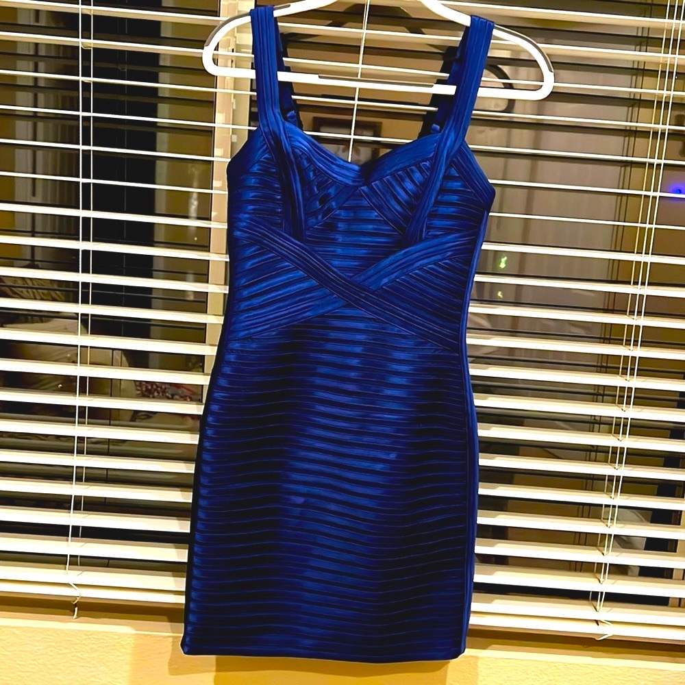 BCBG MaxAzria dress in dark blue. Bandage style, with shoulder straps .